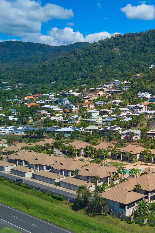 Aerial of City View Villas against the hill and bright blue sky