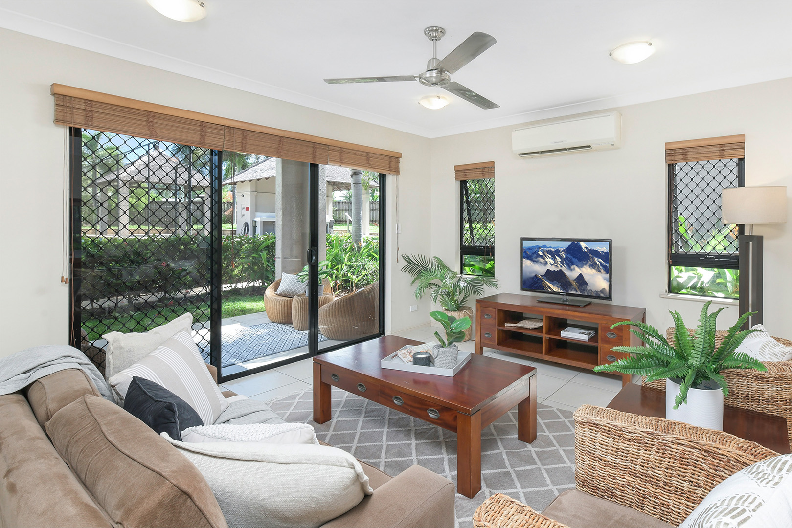 Living space at City View Villas with lounge and french doors